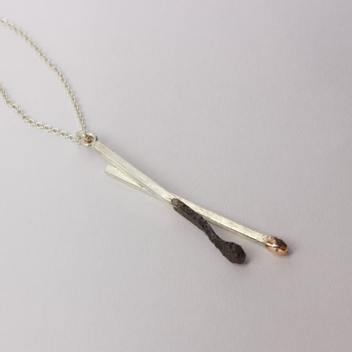 DM267C: Burnt and live matchstick pendant, large