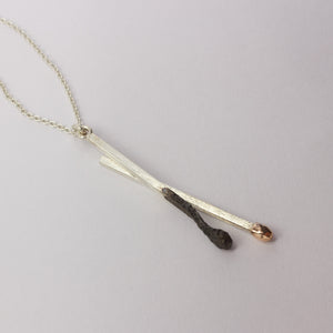 DM267C: Burnt and live matchstick pendant, large