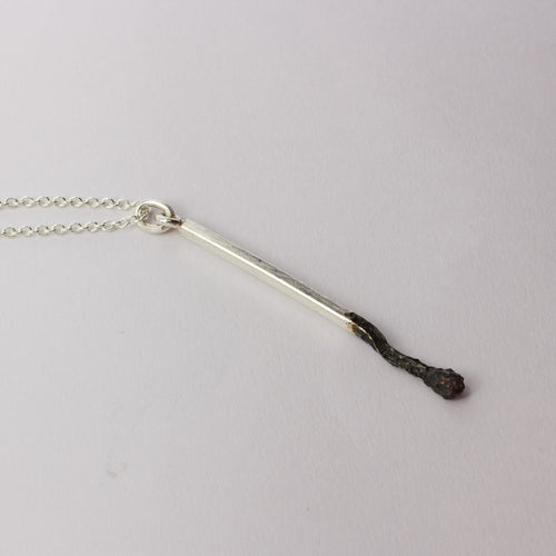 DM269C: Burnt matchstick pendant