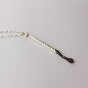 DM269C: Burnt matchstick pendant