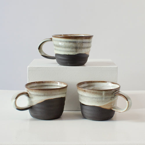 HP Mugs: black clay with white glaze