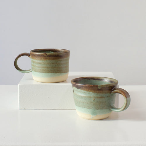 HP Mugs: brown and green on white clay